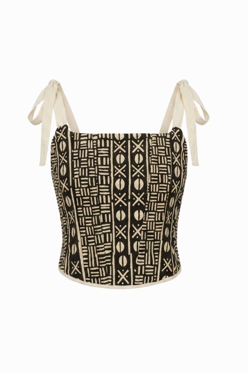 A corset in hand-painted Bogolan cloth, laced at the back