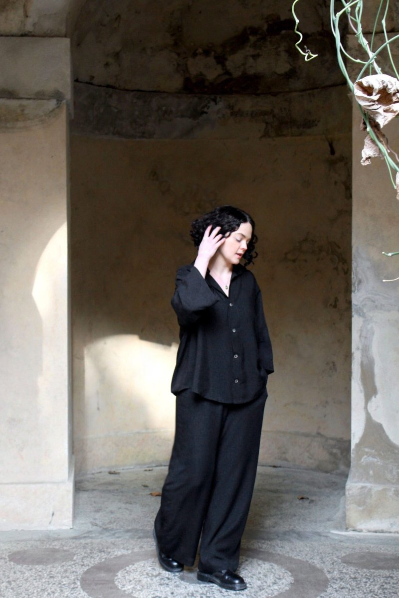 An oversized blouse in TENCEL, cut with wide, cropped sleeves.