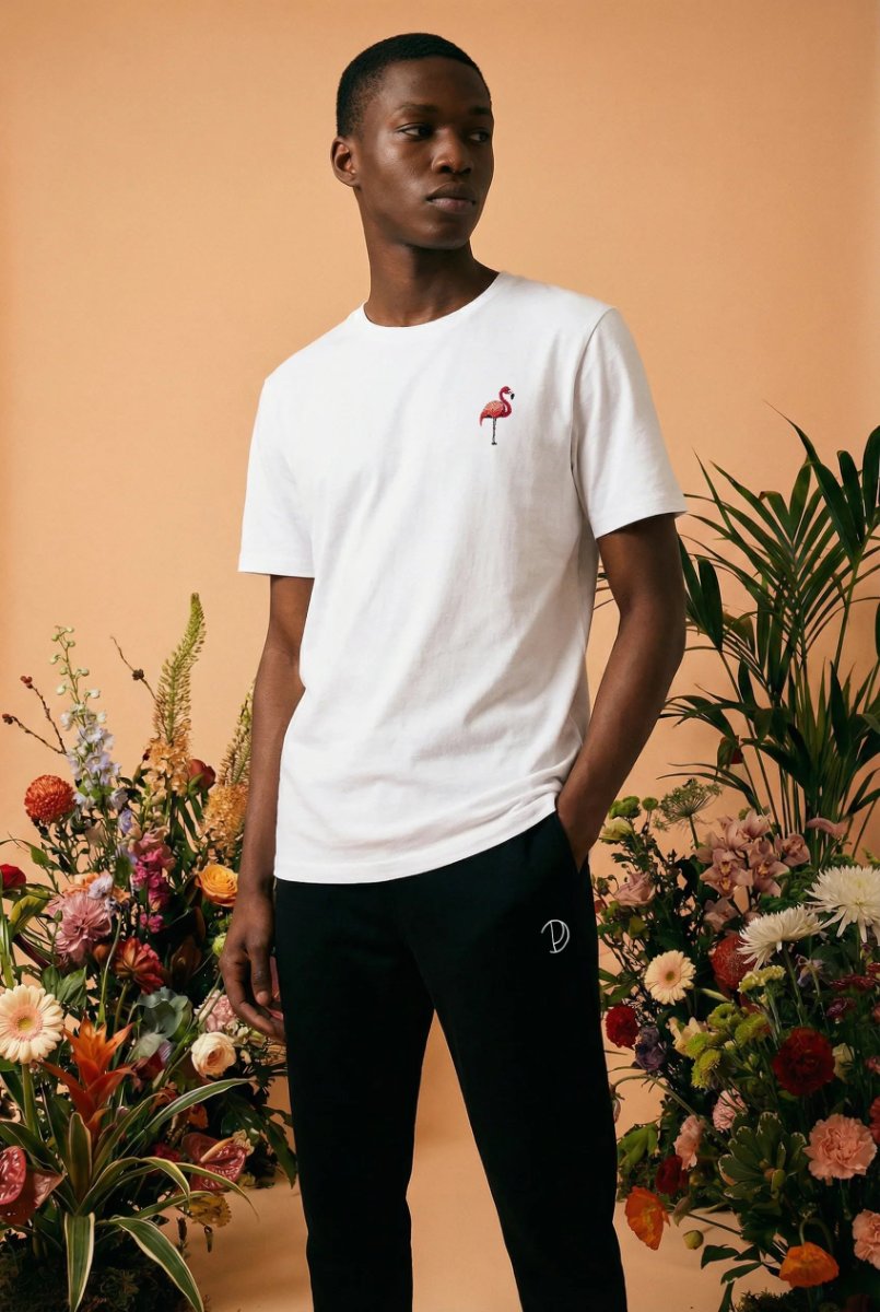 A flamingo drawn by Pedro Trajano, printed on a white t-shirt.