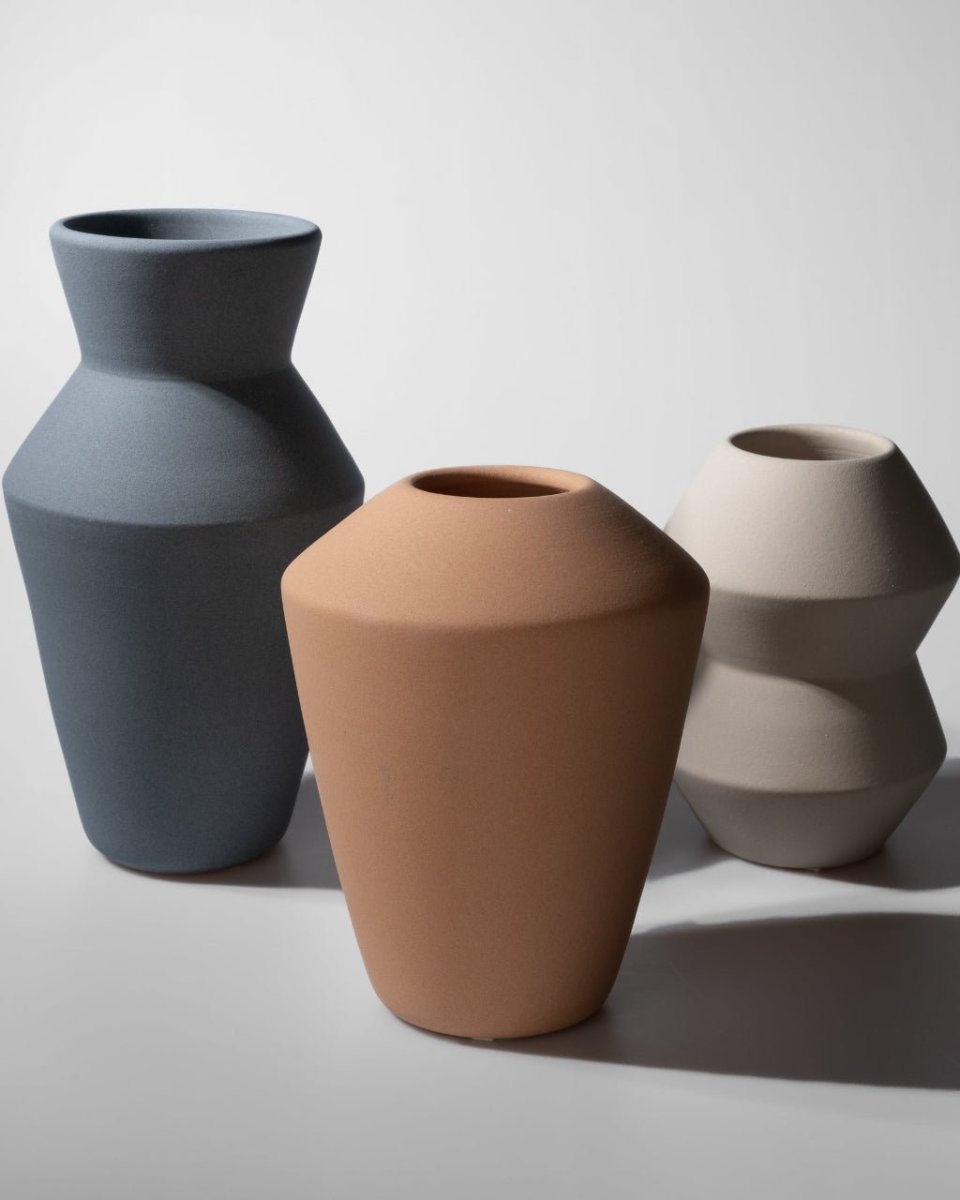 Three of the seven vase shapes, side by side.