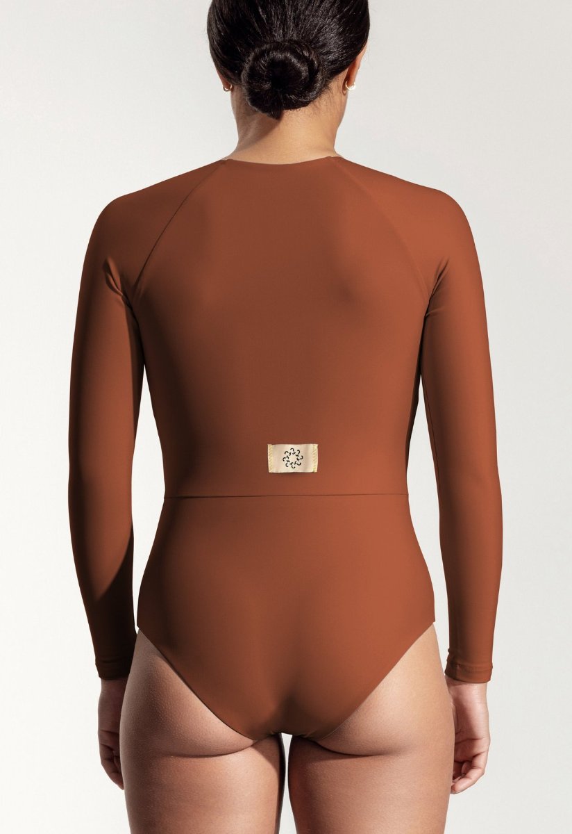 The Orfe, a long-sleeved one-piece in recycled fabric, cut for paddling