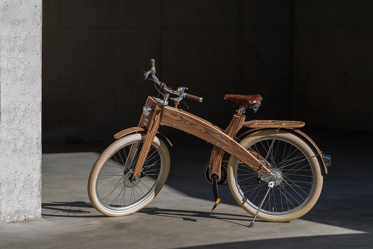 A finished bicycle, frame, fork and mudguards in wood