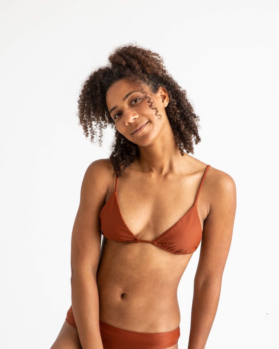 The triangle bikini top, sewn from regenerated nylon.