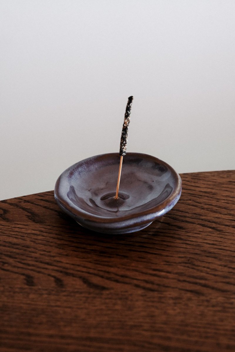 The Nox incense holder, its glaze run from grey into blue and brown